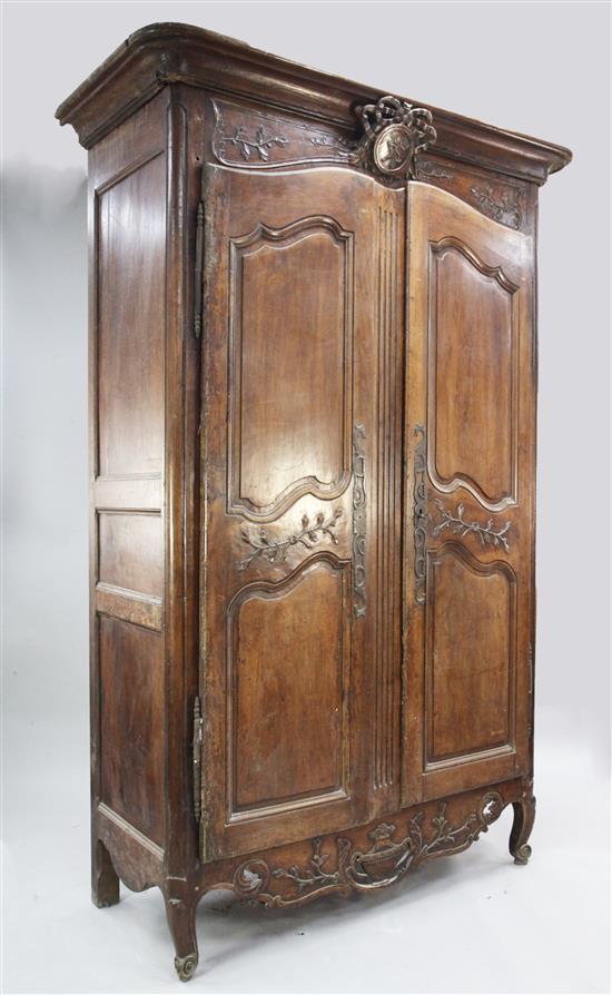 A large 19th century French walnut armoire, H.7ft 9in. W.5ft